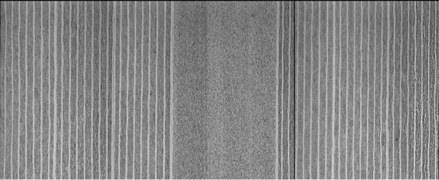 תמונת חתך להב פלדת דמשק GOU - תחת הגדלת מיקרוסקופ X 100 ליבת פלדה SG2 מקופלת בגוש פלדת דמשק פלדה בעלת 50 שכבתות מכל צד, המשלימות יחדיו 101 שכבות - חזקה וחדה, מוכחת בעליונות החרבות היפניות